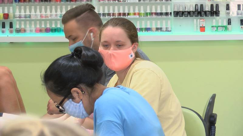 Nail salons still required to use masks under new order.