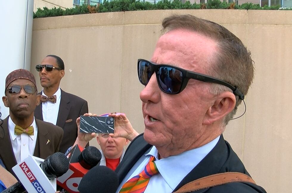 Attorney Jeffrey Reynolds speaks outside the federal courthouse after his client, a member of...