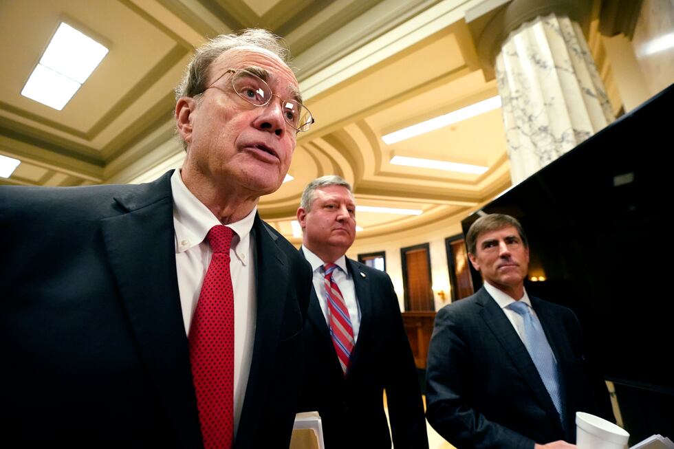 Lt. Gov. Delbert Hosemann, left, speaks to reporters alongside Senate Appropriations Committee...