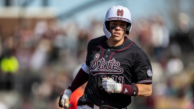 Mississippi State outfielder Kellum Clark (11) jogs the bases after his solo home run against...