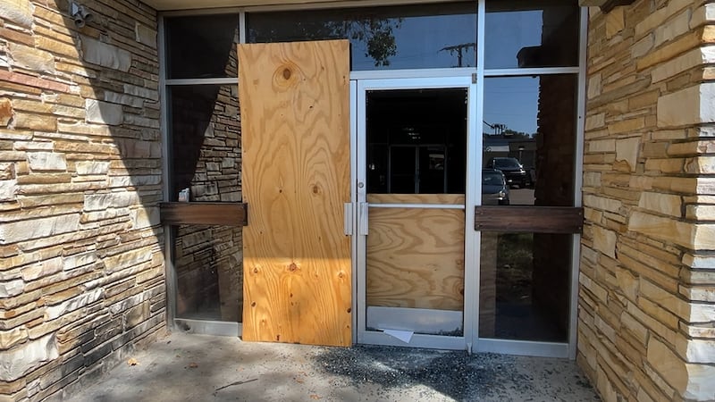 Vandals busted out the windows of a side door at the Wright Library recently.