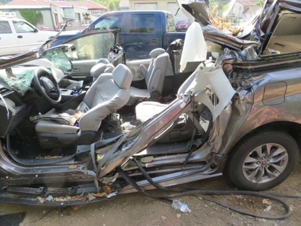 The family's vehicle after it was struck by a falling tree at Biltmore Estates, killing Casey...