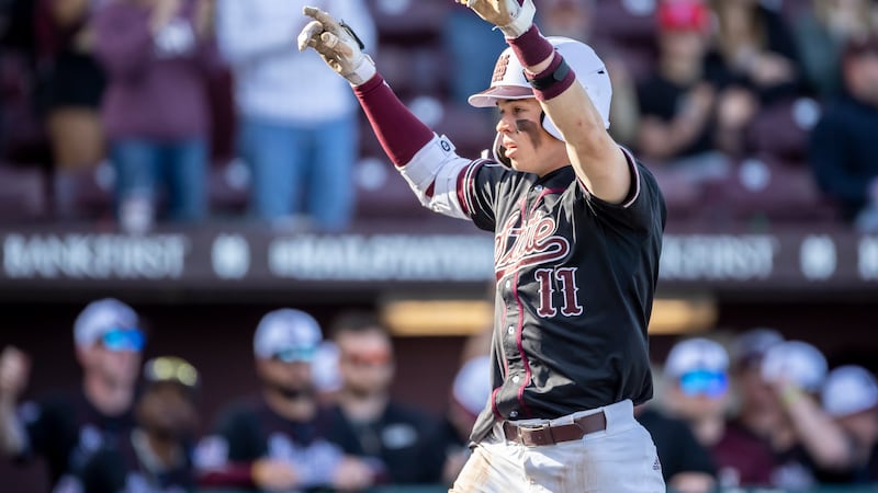Mississippi State outfielder Kellum Clark (11) jogs the bases with his second home run of the...