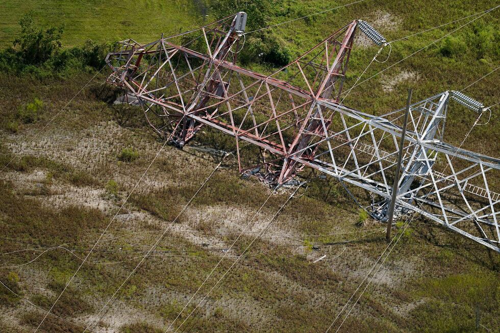 FILE - A twisted tower that carried crucial electrical feeder lines to the New Orleans metro...