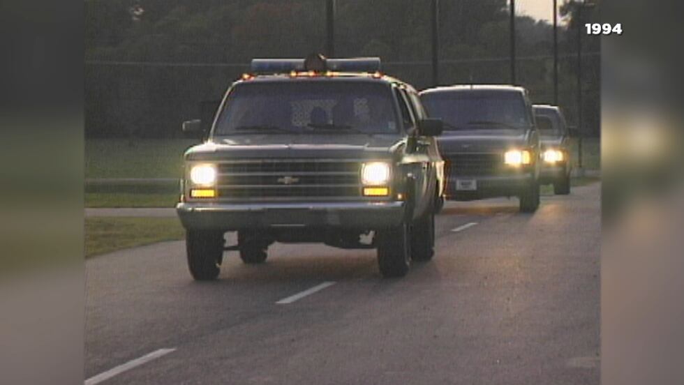 Convoy of vehicles approach the Hinds Co. Detention Center on opening day in 1994