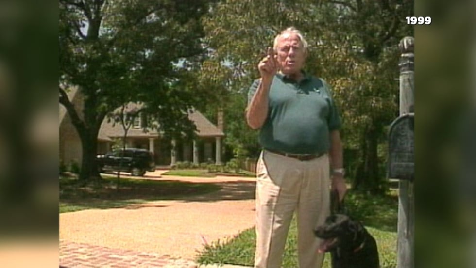 Gov. Kirk Fordice and his dog, Lance, outside his home in Madison in 1999