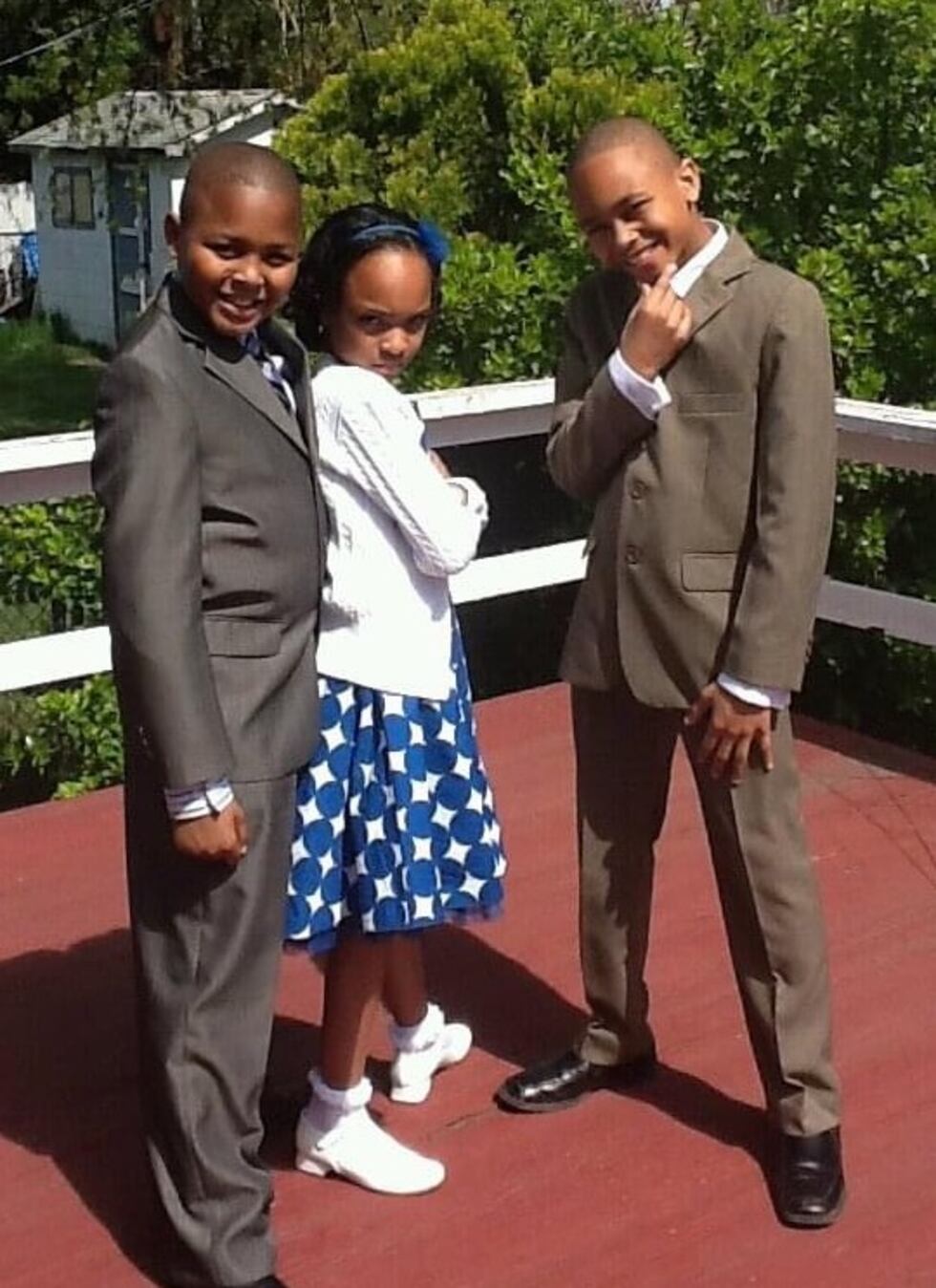 Mickell Gordon, left, and his sibling Justice and D'Lunte Gordon were raised in the military...