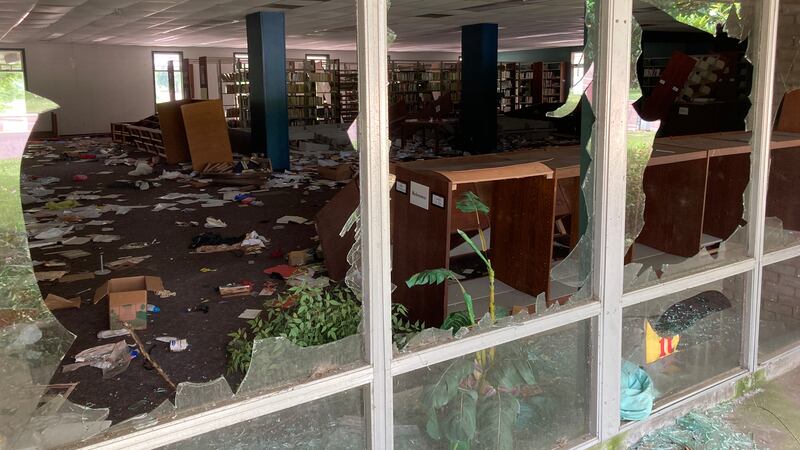 Windows at the Charles Tisdale Library were knocked out previously after city crews attempted...