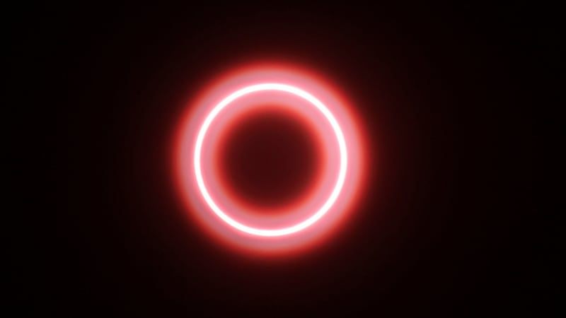 FILE - In this Thursday, Dec. 26, 2019 photo, an annular solar eclipse is seen through a...