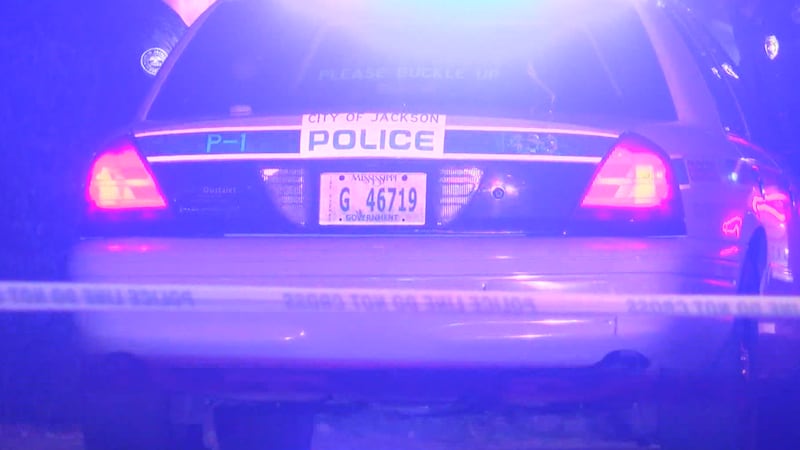 A Jackson police car at a crime scene.