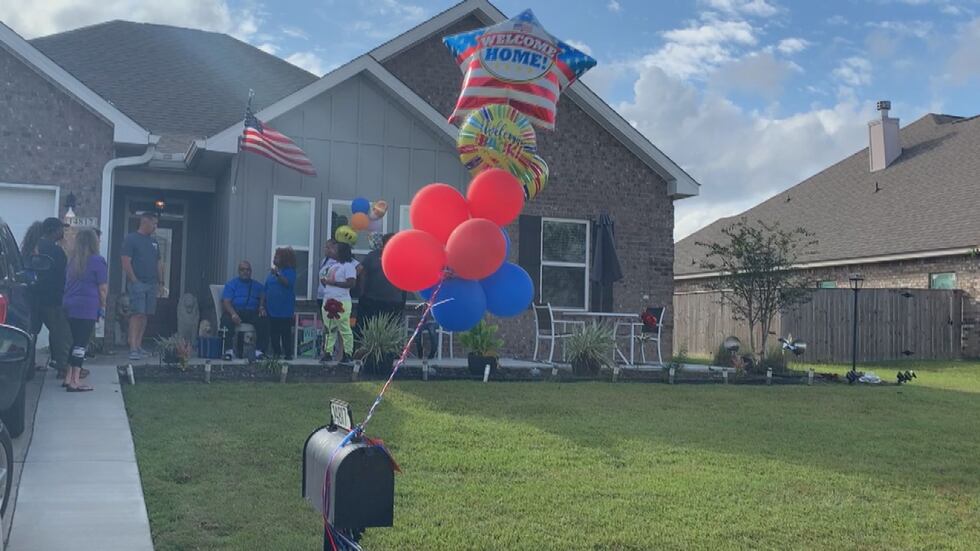 Friends, family and neighbors gathered Sunday to welcome home Eric Ward, who spent 40 days in...